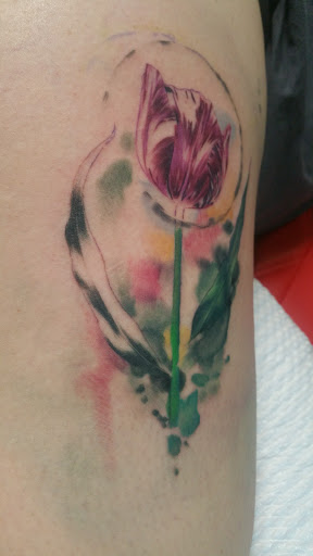 Explore beautiful flower tattoo ideas, creative tattoo ideas in Arlington, available at Urbans Tattoo & Piercing Studio