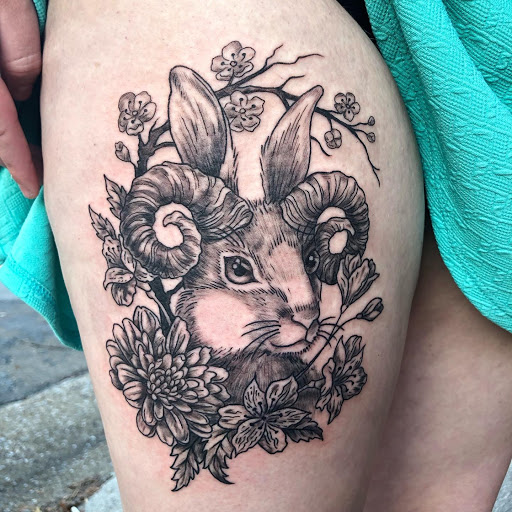 Explore january birth flower tattoo ideas, creative tattoo ideas in Chattanooga, available at Standard Ink Tattoo Co