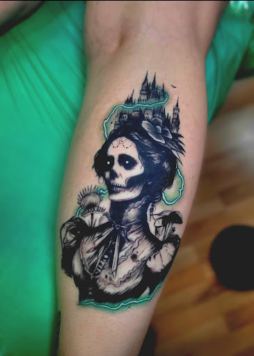 Explore carnage tattoo ideas, creative tattoo ideas in Benton, available at Spectrum Tattoo