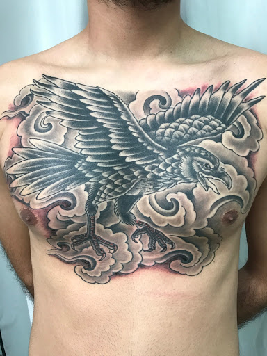 Explore hockey tattoo ideas, creative tattoo ideas in Greenville, available at Great Wolf Tattoo