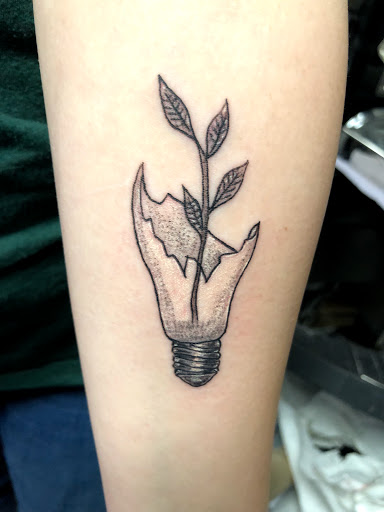 Explore cancer ribbon tattoo ideas, creative tattoo ideas in Charlottesville, available at Mystic Tattoo and Body Piercing