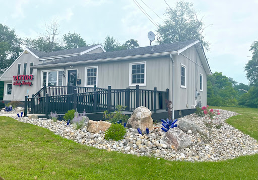 Explore logging tattoo ideas, creative tattoo ideas in Deptford, available at THE CONVENT Tattoo & Body Piercing Studio