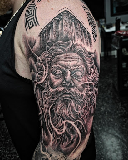Explore black and grey tattoo ideas, creative tattoo ideas in Fort Myers, available at Loyal 2 The Coil Tattoos & Piercings (Edison Mall Location Entrance F)