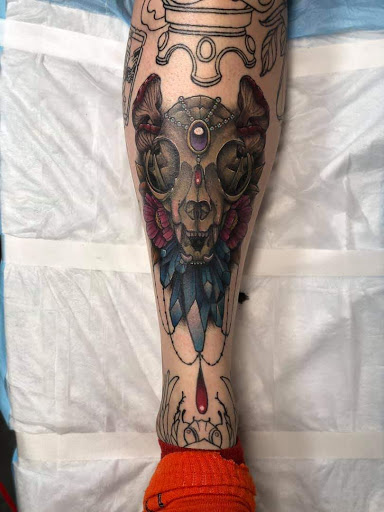 Explore rose tattoo ideas for men, creative tattoo ideas in Dubuque, available at The Crows Nest