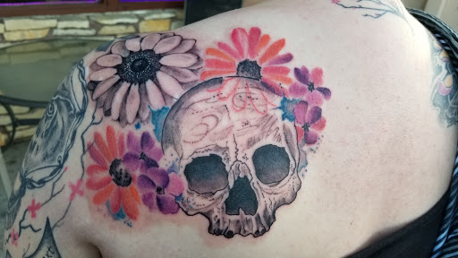 Explore small jesus tattoo ideas, creative tattoo ideas in Roscoe, available at Elevated Ink Tattoo