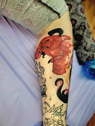 Find alpha and omega tattoo ideas for your next unique tattoo in Benton at Spectrum Tattoo