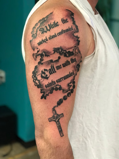 Explore back shoulder tattoo ideas for men, creative tattoo ideas in Wappingers Falls, available at Leo Tats Tattoo
