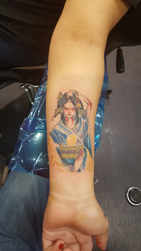 Explore side leg tattoo ideas, creative tattoo ideas in Carmel, available at Indiana Tattoo Company