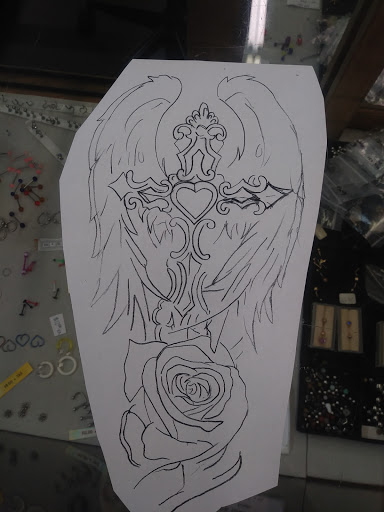 Explore cool tattoo ideas for guys small tattoos, creative tattoo ideas in Hubbard, available at Squirrellys Skin Art