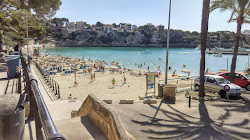 Foto von Platja de Porto Cristo und die siedlung