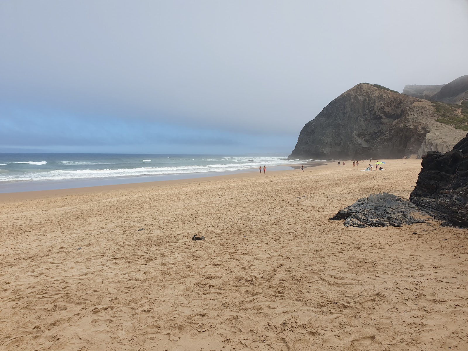 Photo of Barriga Beach surrounded by mountains