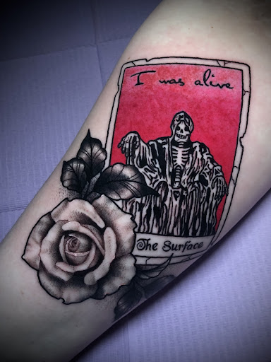 Explore flower garden tattoo ideas, creative tattoo ideas in Adrian, available at Ambition Ink