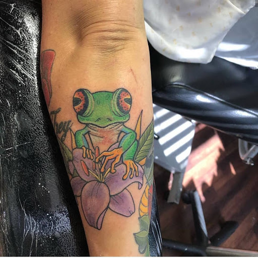 Explore behind ear tattoo ideas, creative tattoo ideas in Reno, available at Evolution Tattoo