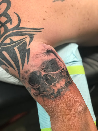 Explore purple tattoo ideas, creative tattoo ideas in Ocala, available at The Tattoo Gallery of Ocala LLC