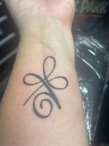 Explore color tattoo ideas, creative tattoo ideas in Ocoee, available at Slaughterized Ink Tattoo and Piercing Studio