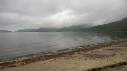 Valokuva Long Beach Campsiteista. tukeutunut kallioilla