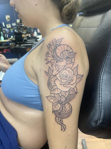 Explore cover up ideas for ankle tattoos, creative tattoo ideas in Cocoa, available at Rorschach Tattoo Shop and Piercing Studio