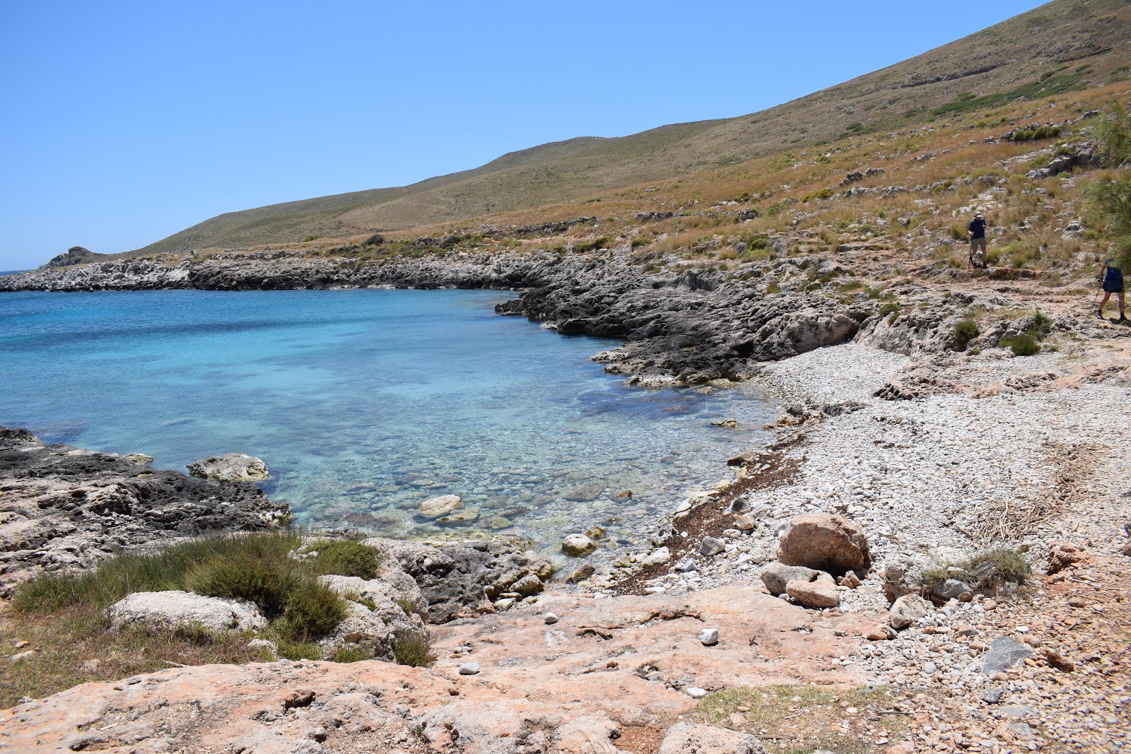 Foto di Tainaro beach con una superficie del ciottoli beige