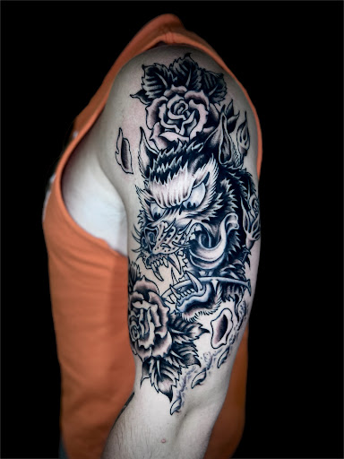 Explore tattoo ideas for guys chest, creative tattoo ideas in Johnson City, available at Gold Cross Tattoo Co.