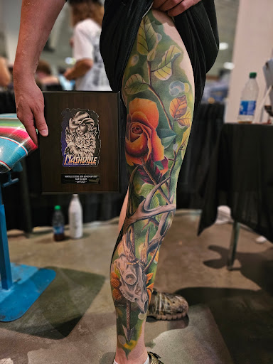 Explore sleeve tattoo background ideas, creative tattoo ideas in Kansas City, available at Golden Stag Tattoo and Gallery