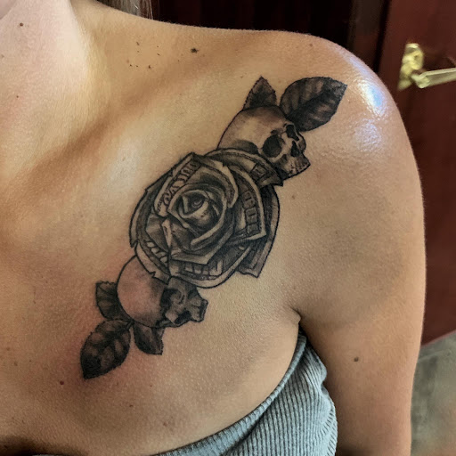 Explore bookworm tattoo ideas, creative tattoo ideas in Clinton, available at Black Relic Tattoo