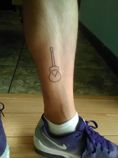 Tattoo Shop «Lucky Rabbit Tattoos», reviews and photos, 611 E McGalliard Rd, Muncie, IN 47303, USA