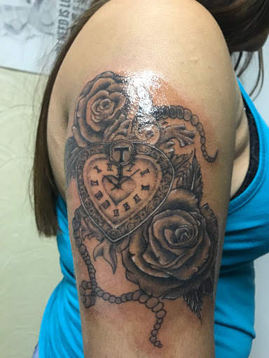 Explore cute cover up tattoo ideas, creative tattoo ideas in Dalton, available at Unkut Productions Inc Tattoo Piercing Studio