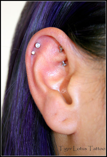 Explore simple hand tattoo ideas, creative tattoo ideas in Fort Myers, available at Tiger Lotus Tattoo and Piercing