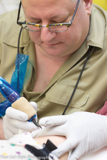 Explore tattoo ideas on tricep, creative tattoo ideas in Shakopee, available at Crazy Lady Ink LLC