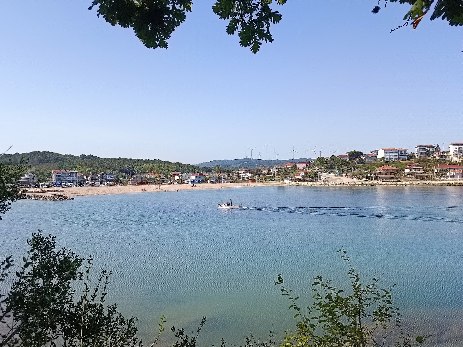 Fotografie cu Seyrek Plaji cu o suprafață de apa pură turcoaz