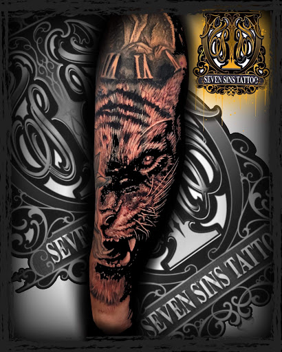 Explore bike tattoo ideas, creative tattoo ideas in Sarasota, available at SEVEN SINS Tattoo Studio