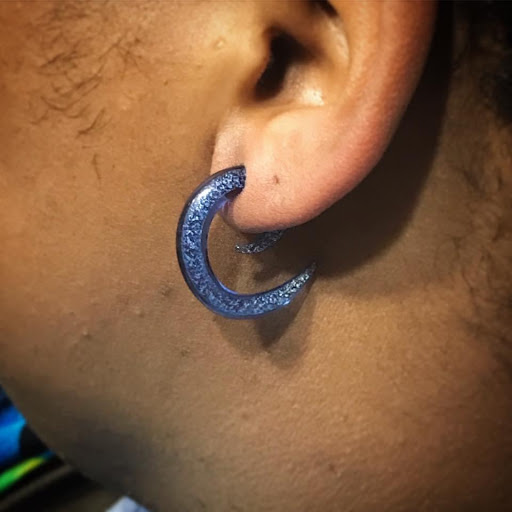 Explore tattoo ideas for upper back, creative tattoo ideas in Louisburg, available at Purple Dot Piercings