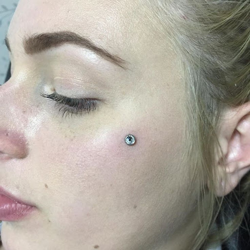 Explore cute monkey tattoo ideas, creative tattoo ideas in Elko, available at Custom Tattoos and Body Piercing Studio