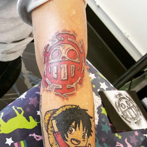 Explore family birth flower tattoo ideas, creative tattoo ideas in Redding, available at Caddy Daddys