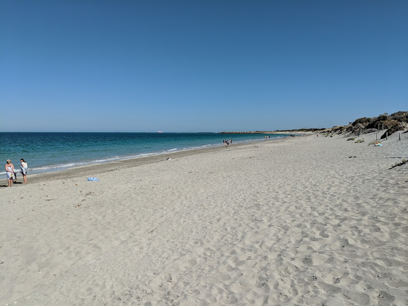 Fotografija CyoConnor Beach z svetel pesek površino