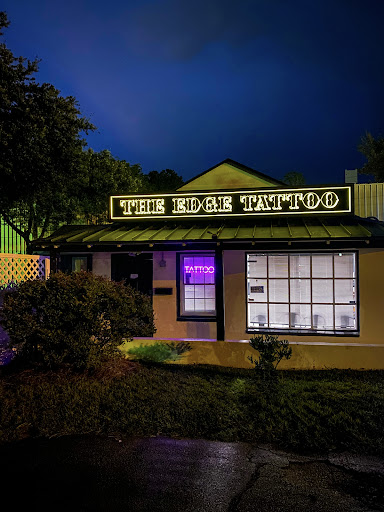 Explore simple silver lining tattoo ideas, creative tattoo ideas in Charleston, available at The Edge Tattoo Studio