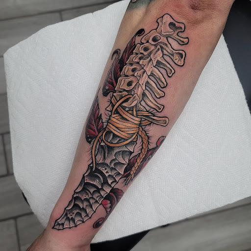 Explore bane tattoo ideas, creative tattoo ideas in Painesville, available at The Inkwell Tattoo Company