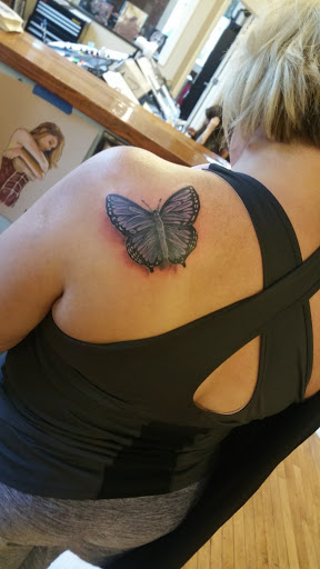 Tattoo Shop «The Shop», reviews and photos, 141 S Grand Ave, Fowlerville, MI 48836, USA