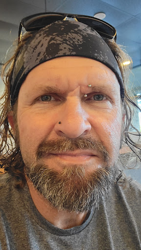 Explore skier tattoo ideas, creative tattoo ideas in Redding, available at J Varnum Body Arts Single Track Tattoo