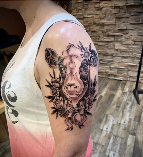 Explore mens tattoo sleeve ideas black and grey, creative tattoo ideas in Hudson, available at St. Croix Ink Tattoo