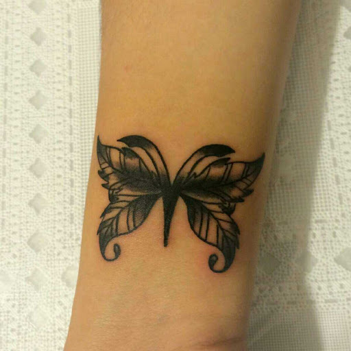 Explore growth tattoo ideas, creative tattoo ideas in Buffalo, available at Wishful Inking Tattoos & Piercings