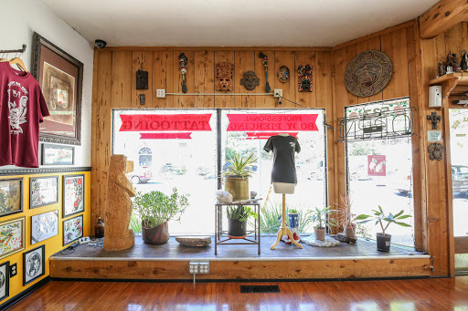 Explore red ink tattoo ideas for guys, creative tattoo ideas in Placerville, available at Royal Six Tattoo