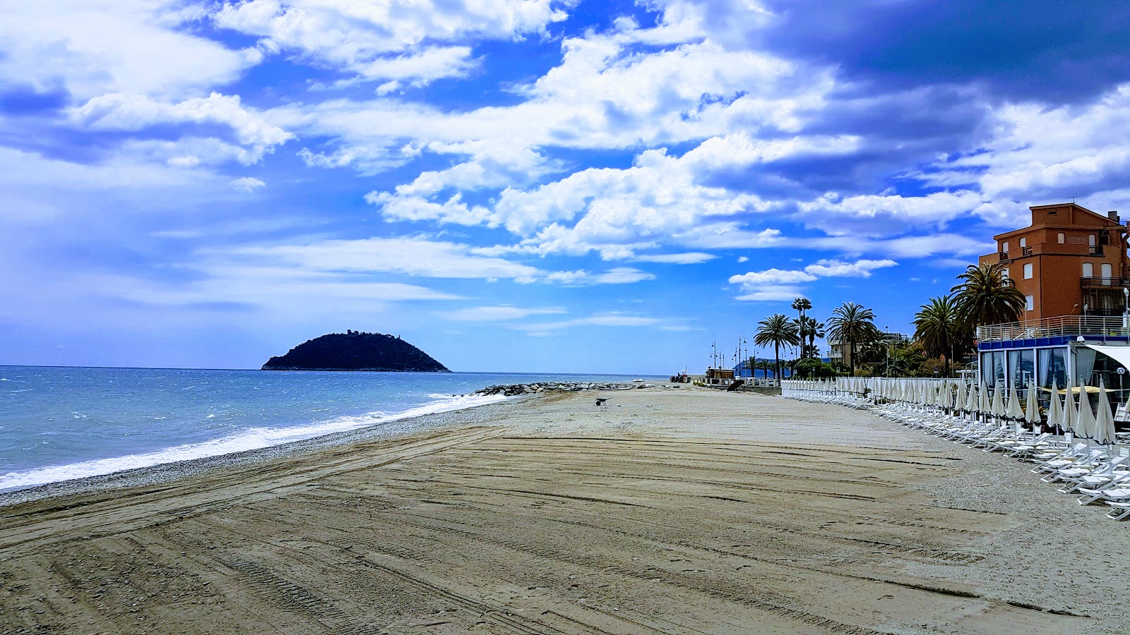 Foto av Doria beach med rymlig strand