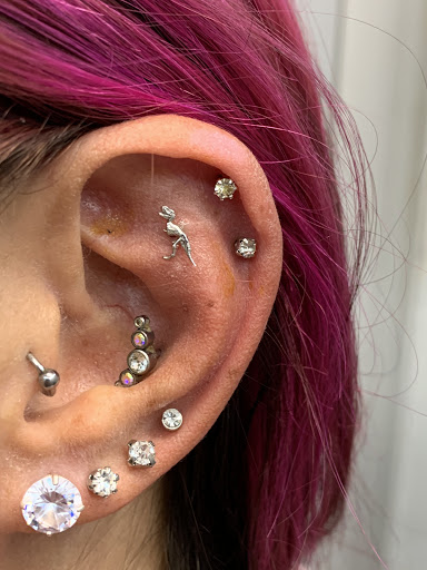 Explore world traveler tattoo ideas, creative tattoo ideas in Plymouth, available at MHP Creations Body Piercing