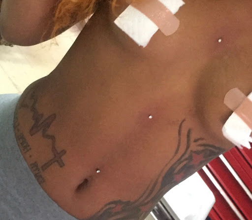 Explore african tattoo ideas, creative tattoo ideas in Milwaukee, available at Piercings Plus