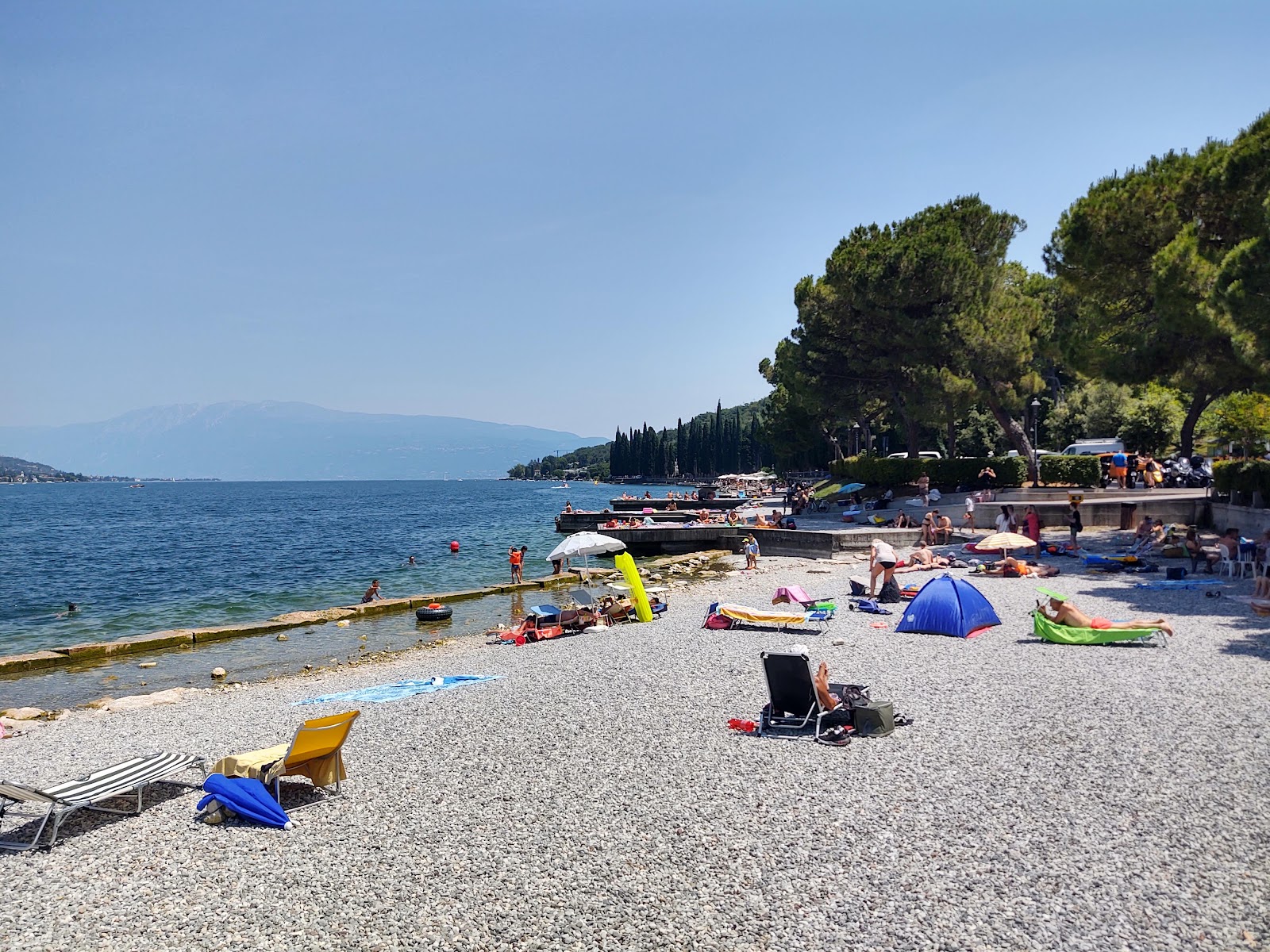 Foto van Spiaggia Mulino met grijze fijne kiezelsteen oppervlakte