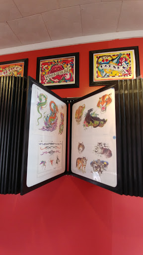 Explore tattoo ideas for cover up, creative tattoo ideas in Warren, available at Elite Ink Tattoo Studios