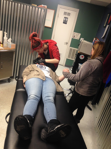 Explore grapevine tattoo ideas, creative tattoo ideas in Kent, available at War Horse Ink