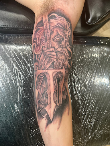 Explore compass tattoo ideas for guys, creative tattoo ideas in Cincinnati, available at Inkflow Tattoo Studio