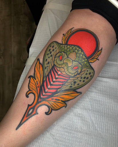 Explore family over everything tattoo ideas, creative tattoo ideas in Asheville, available at Valentine Tattoo & Piercing